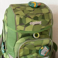 X-Coudre des patchs pour cartables